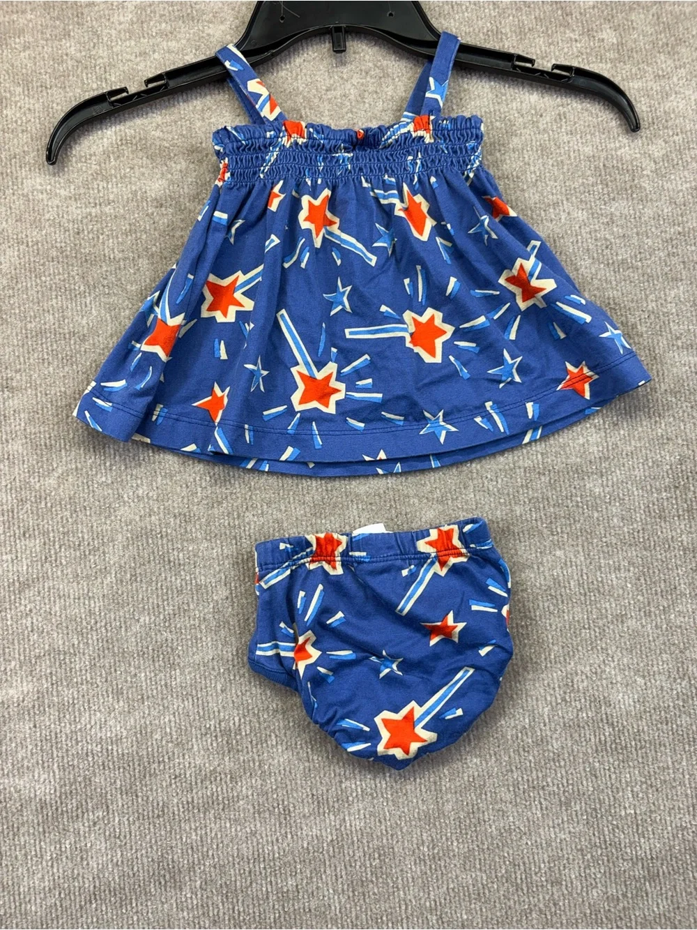 Hanna Andersson blue smocked dress featuring a red and blue 